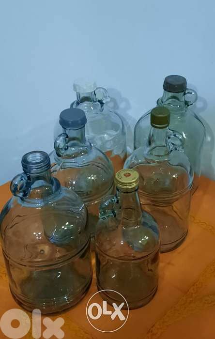 Glass galons. sizes:small 24cm,medium 27cm,L 31cm,XL 33cm غالون زجاج 0