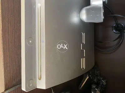 MOVING SALE - PS3 great condition with two controllers + 5 Free Games