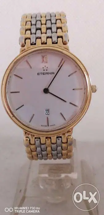 Eterna watch Quartz slime men’s gold still