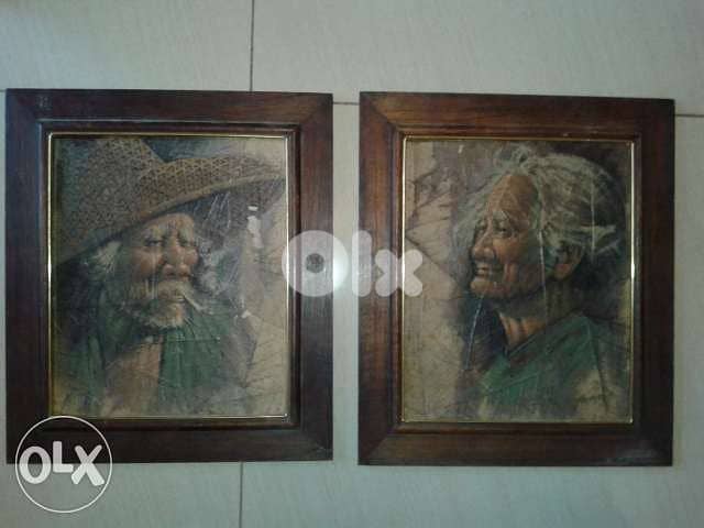 two old paintings on leaves signed size 34*39cm with the frame 0