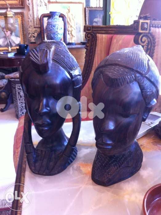 2 têtes en bois massif 0
