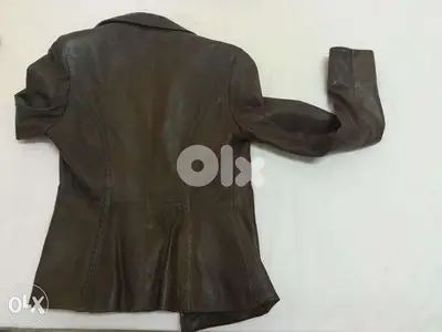 Brown leather jacket unused. Size 36