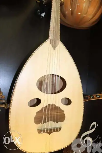 عود زرياب صوت جميل مع شنطه وريشه مقاس ٣/٤