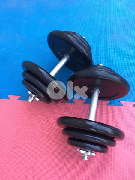 rubber dumbells 40 kilo like new we have also all sports equipment 0