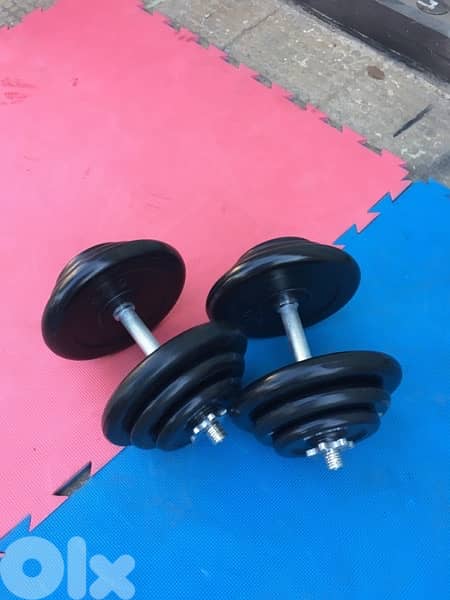rubber dumbells 40 kilo like new we have also all sports equipment 1
