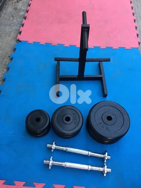 rubber dumbells 40 kilo like new we have also all sports equipment 4