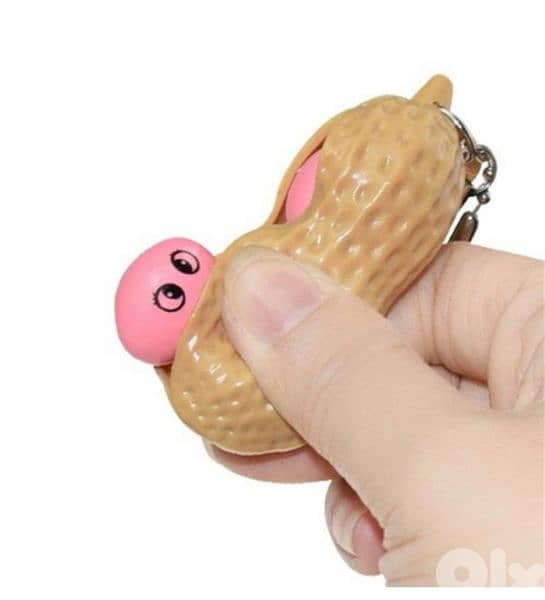 2 in 1 keychain and cute fidget pop out squeeze 3$ 10