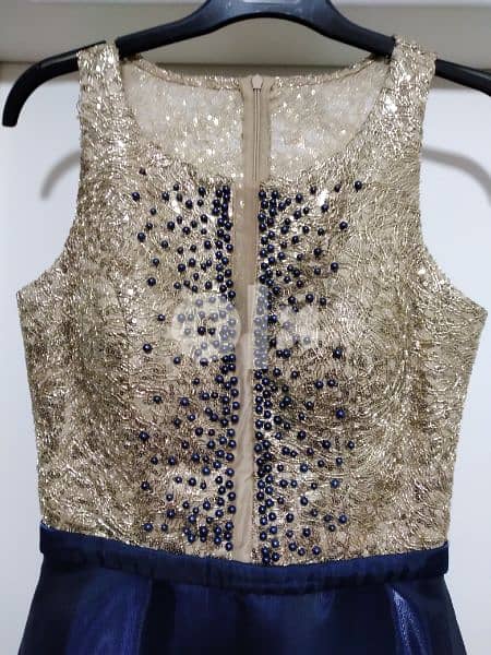 long dress ,used one time ,good quality ,clean ,blue marine with gold 0