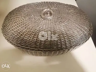 Cache pyrex tressé argent.