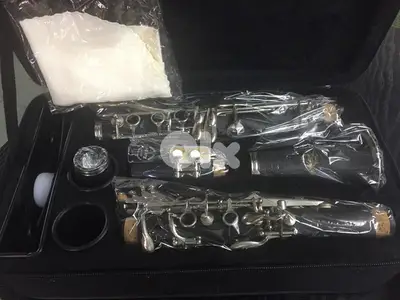 clarinet black full package كلارينت جديدة بالعلبة مع كل اغراضها