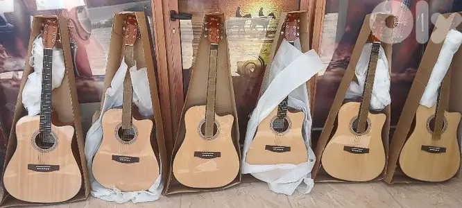 acoustic guitar new in box 4/4