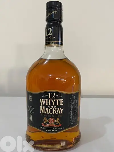 rare antique bottle of white and McKay