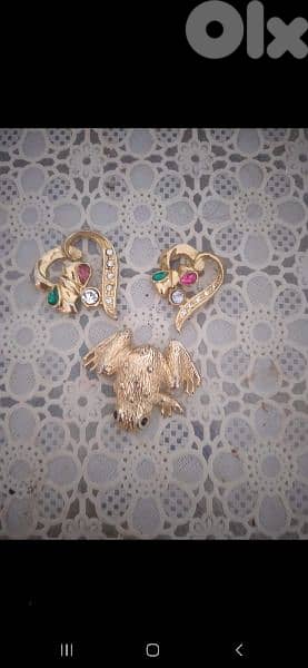 brooch 2 models gold colour 0