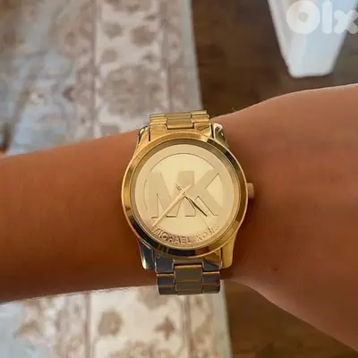 watch MK copy gold Runway used twice