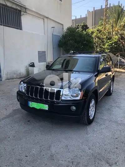 For sale 2006 Jeep Grand Cherokee black with grey leather interior