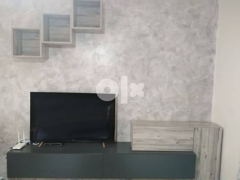 unit TV 1