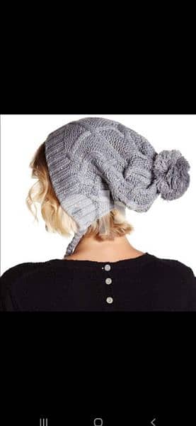 grey wool hat withover ears. 2