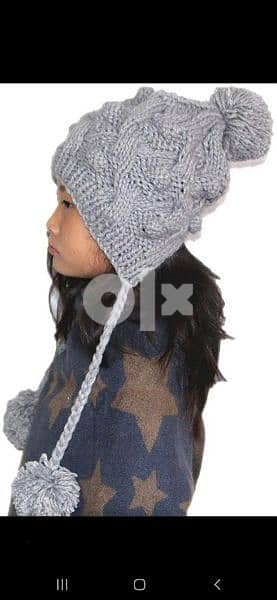 grey wool hat withover ears. 4
