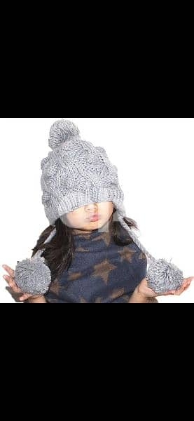 grey wool hat withover ears. 5