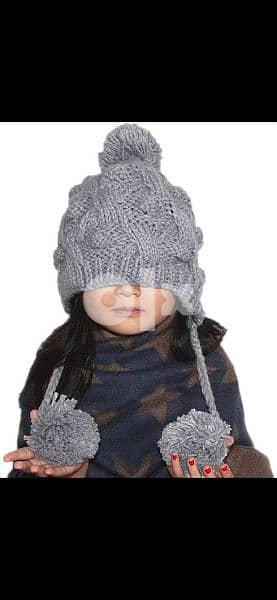 grey wool hat withover ears. 6
