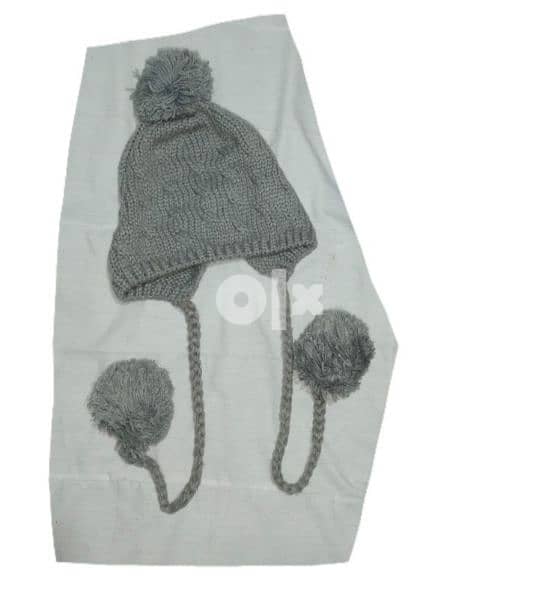 grey wool hat withover ears. 7