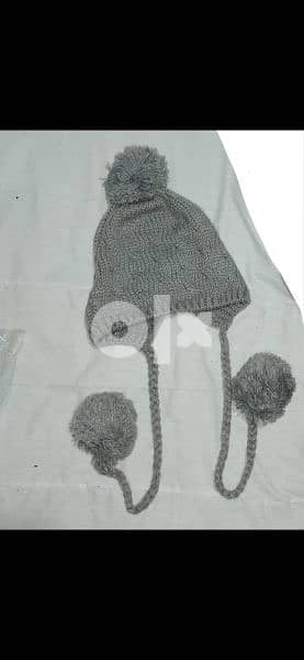 grey wool hat withover ears. 8