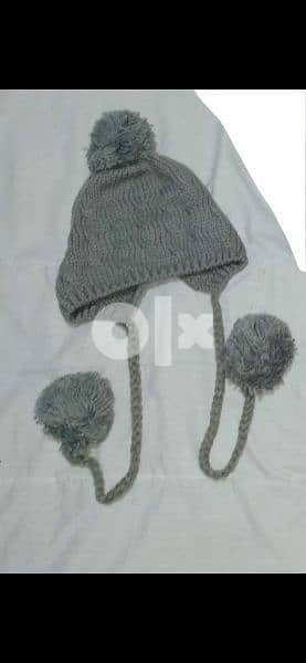 grey wool hat withover ears. 9