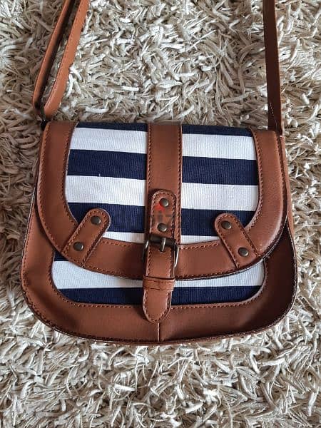 navy and brown stripped cross bag 1