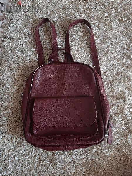 BURGUNDY leather backpack 1