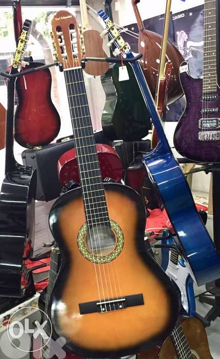 classical guitars all sizes available غيتار 2