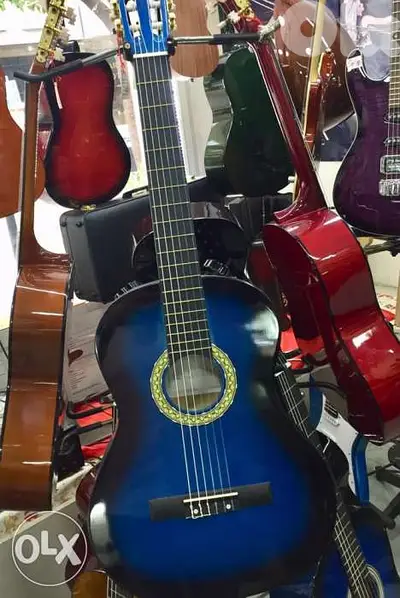 classical guitars all sizes available غيتار