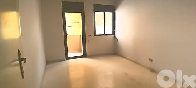 L10004 - Apartment For Sale in Adonis With A Garden