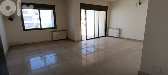 RWK138JS - Apartment For Sale in Ballouneh - شقة للبيع في بلونة
