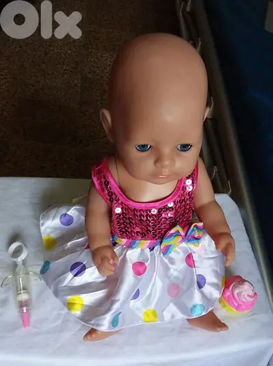 BABY BORN GIRL ZAPF BIG as new toy has a DRINK WET system=22$