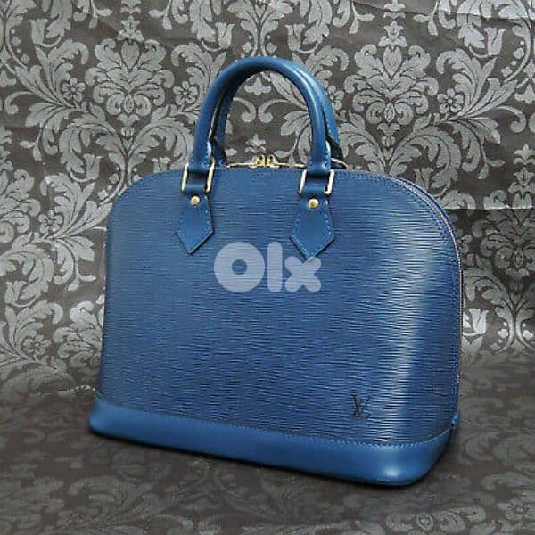 bag Copy LV Epi Alma blue big size used onc 9