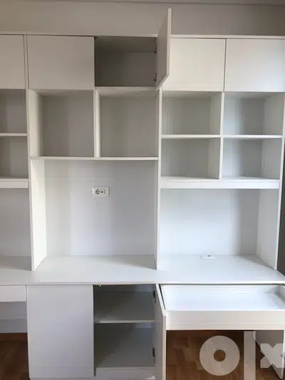 bedroom wall unit with two desks