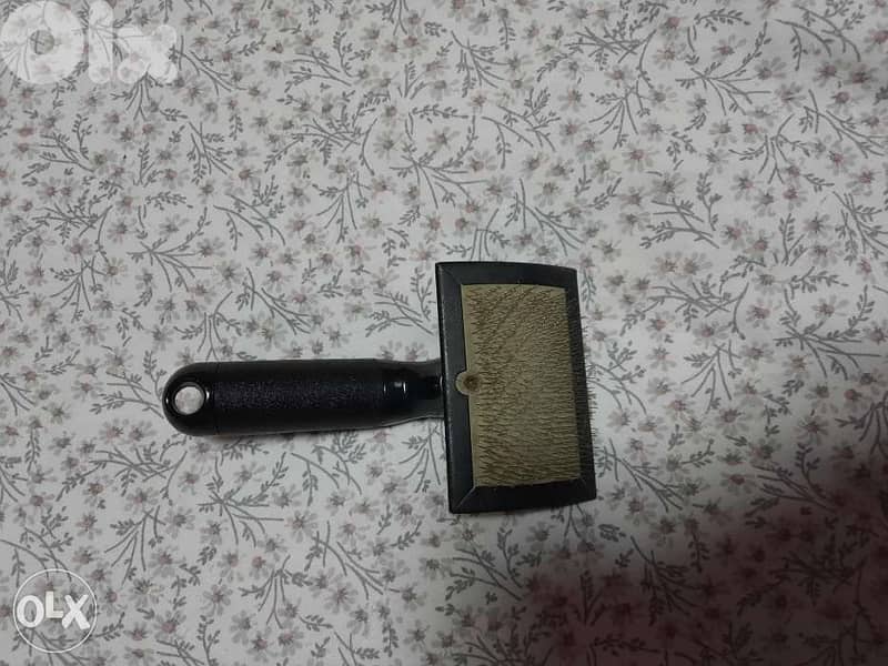 Pet comb. $5 مشط 1