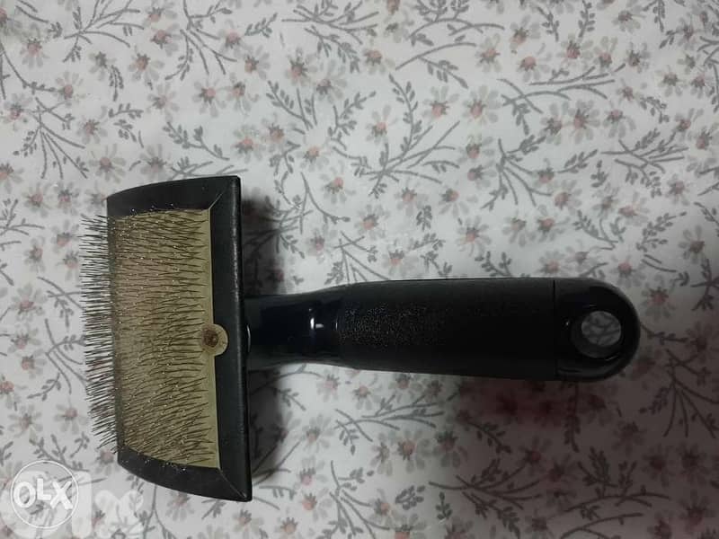 Pet comb. $5 مشط 0