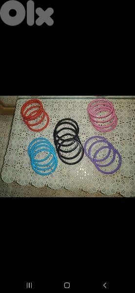 plastic brac3lets 6 colours strass all over 5=15$ 5