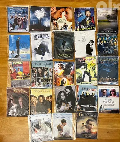 23 DVDs (Movies and Series)