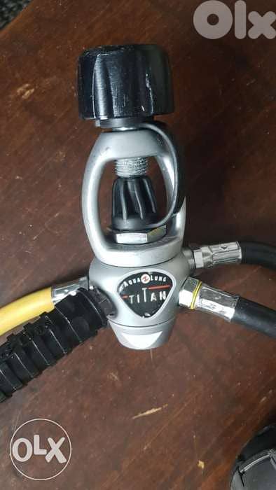 Aqualung regulator with Suunto Spg depth gauge and compass 1