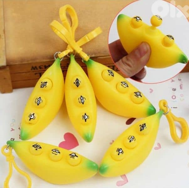 2 in 1 keychain and cute fidget pop out squeeze 3$ 5