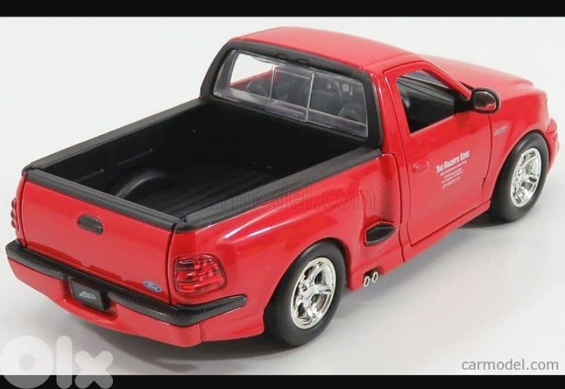 Ford F150 SVT Lighting (Fast & Furious) diecast car model 1:24. 4