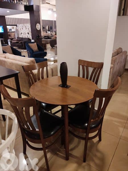 Table and 4 chairs. 1