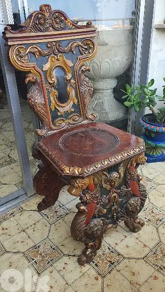 antique wood  chair carved and colored