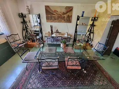 Dining table with 6 chairs made of steel for sale