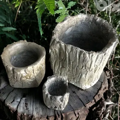 Small round concrete planters