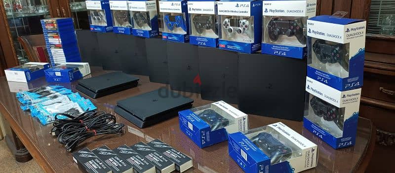 playstation 4 slim European with 2 controller all cable and 2 games 0