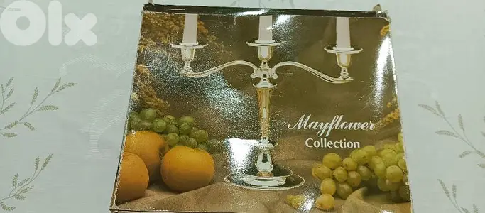 two 3 light silver plated candle holders. made in england