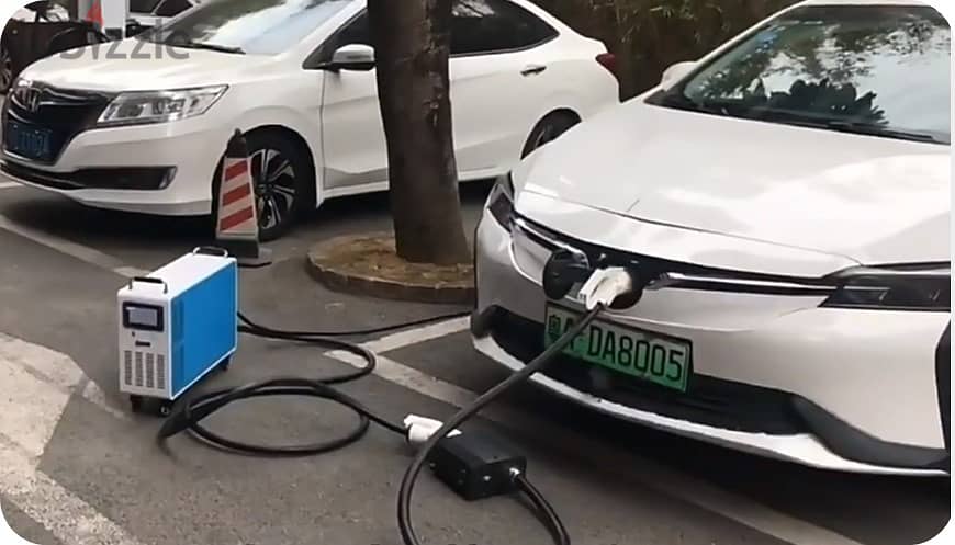 "EV Charging / @0.65 $ per kwh شحن السيارة الكهربائية / @0.65 $ per kw 1